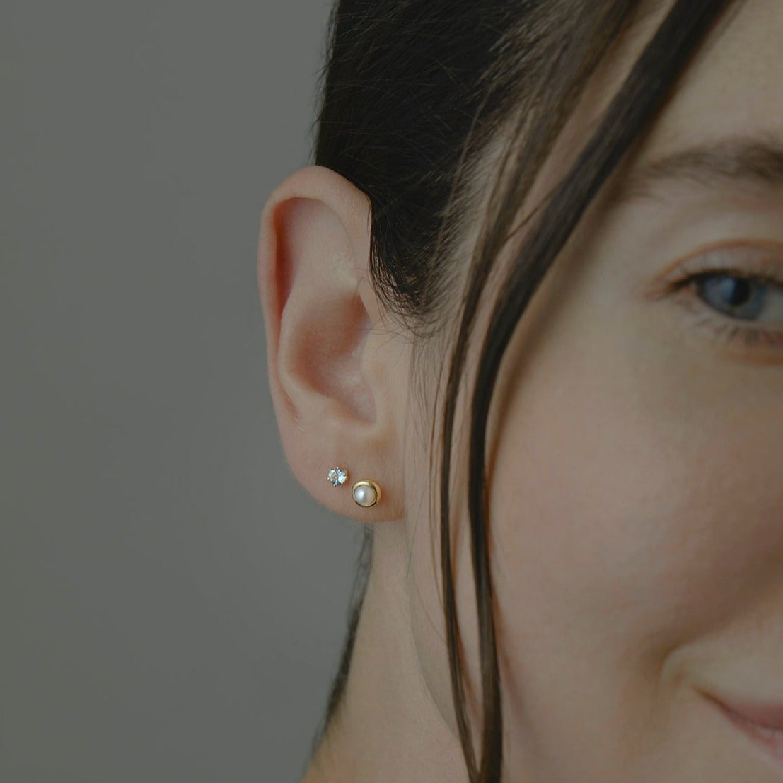 Gold Trimmed Pearl Studs